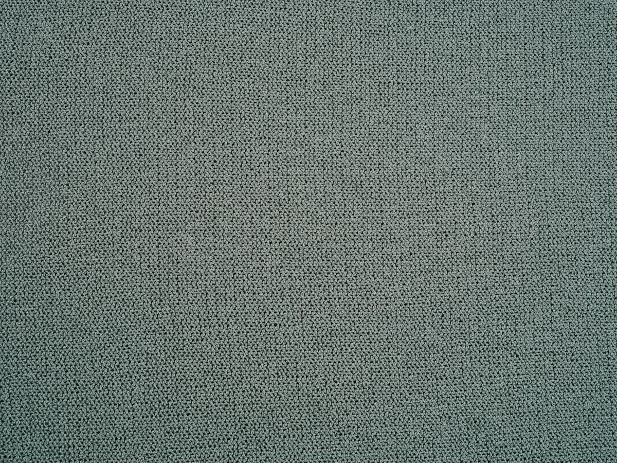 Soft grey-sage textured fabric